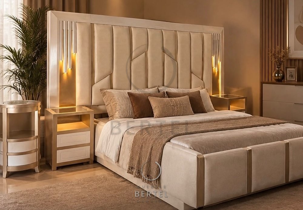 Cama tapizada con cabecero alto y luces laterales